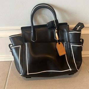 Reed krakoff tote black with white pipping